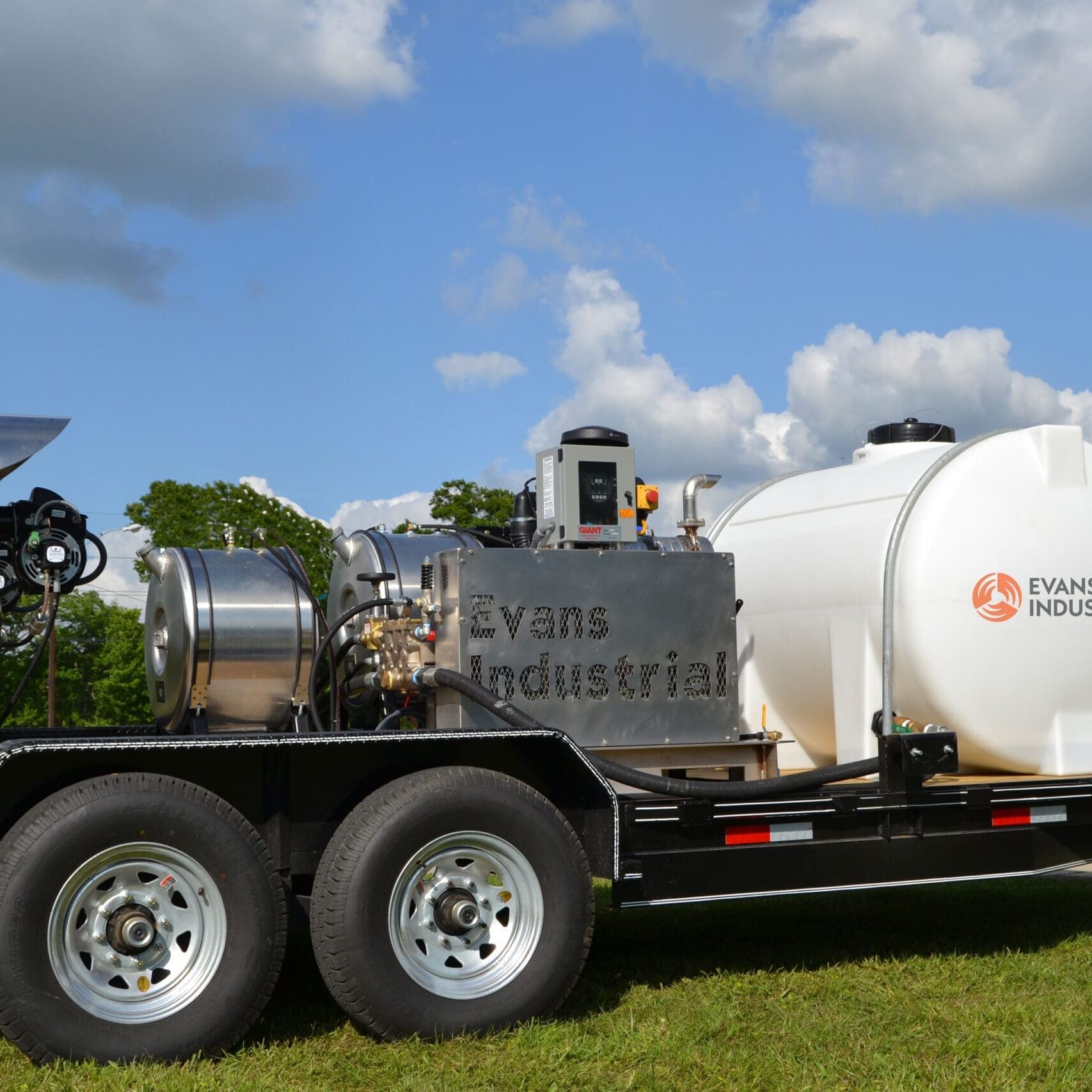 Evans Industrial trailer-mounted heated bean pump with water tank, hose reel, and burner unit